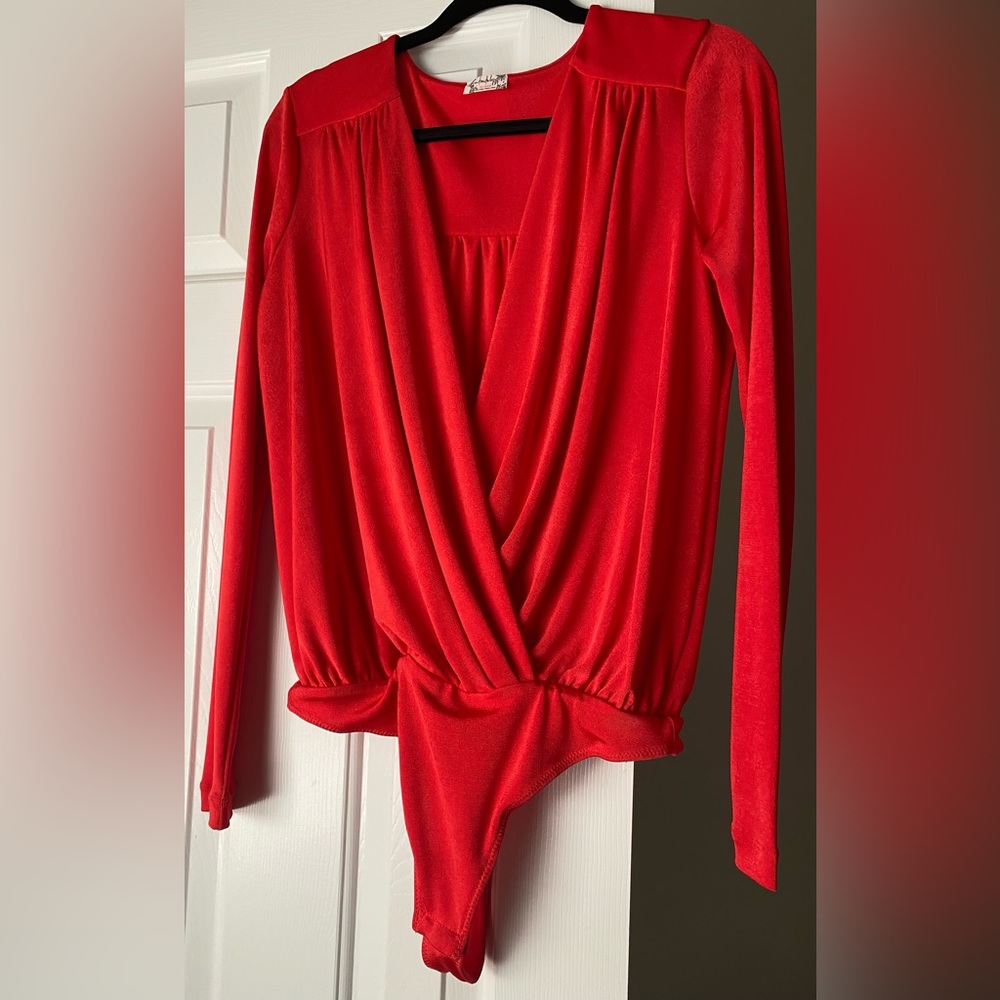 Free People Turnt Bodysuit. Color Bella Rosa. Sz. M